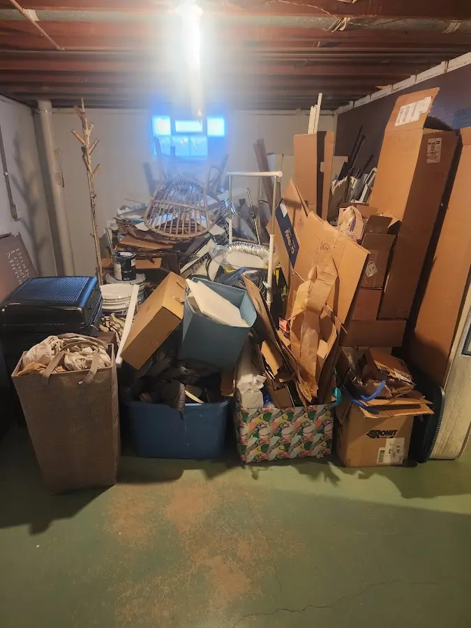 Roll-off dumpster container at job site for 4 Yard Dumpster Rental in Cochran